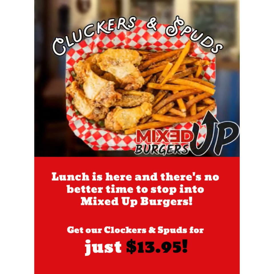 Basket of crispy chicken wings and golden french fries from Mixed Up Burgers.